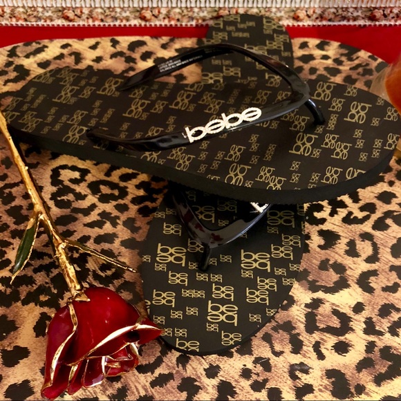 bebe Shoes - Black and Gold BeBe Flip Flops